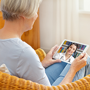 Three Rivers patient talking to a doctor via TeleHealth.